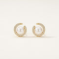14K solid gold pearl crescent stud earrings on a warm ivory background