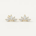 14K solid gold crystal lotus stud earrings on a warm ivory background