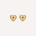 14K solid gold stud earrings on a warm ivory background