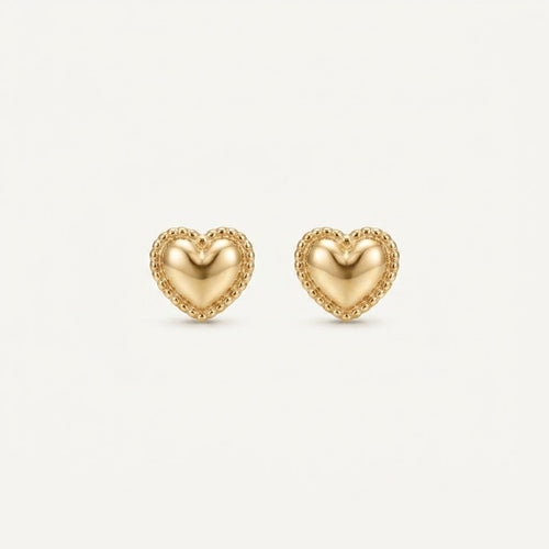 14K solid gold stud earrings on a warm ivory background
