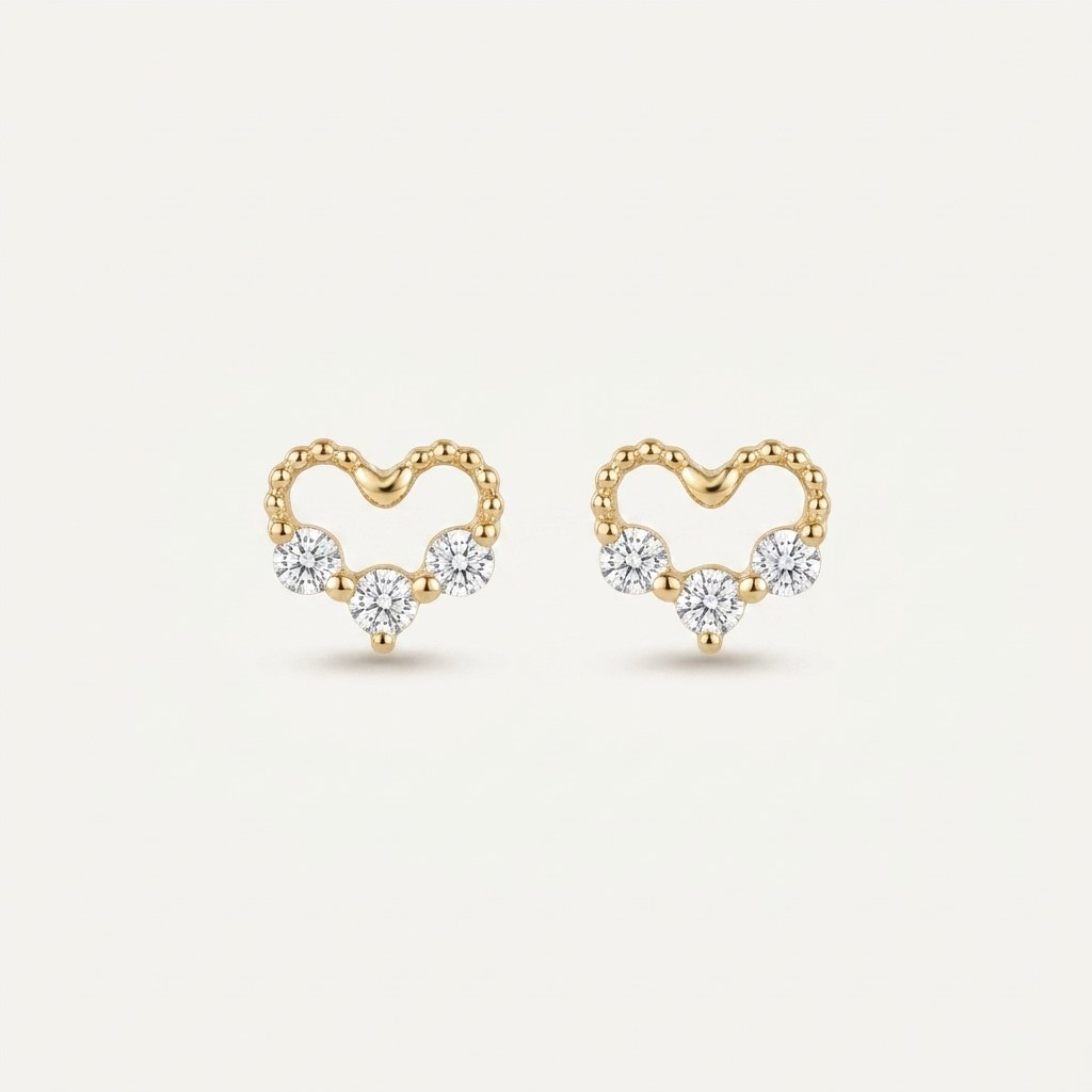 14K solid gold stone-set stud earrings on a warm ivory background