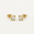 14K solid gold square bezel stud earrings on a warm ivory background