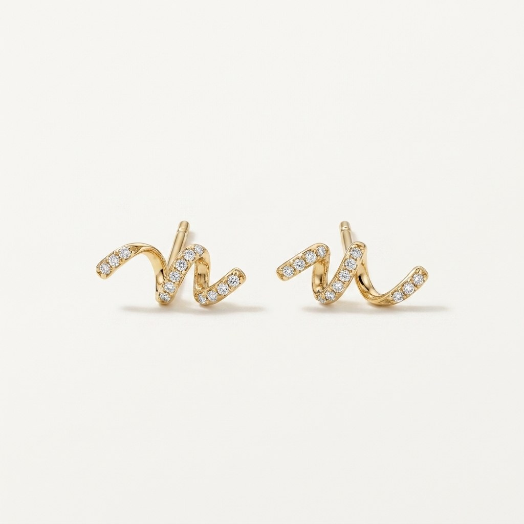 14K solid gold crystal wave climber stud earrings on a warm ivory background