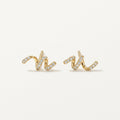 14K solid gold crystal wave climber stud earrings on a warm ivory background