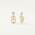 14K solid gold stone-set stud earrings on a warm ivory background