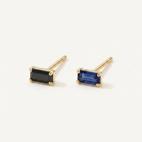 14K solid gold black emerald cut stud earrings on a warm ivory background