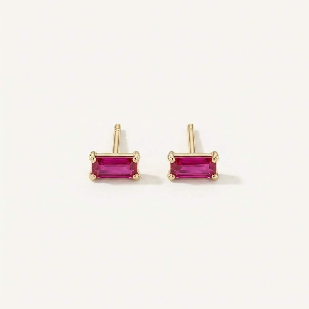 14K solid gold pink baguette stud earrings on a warm ivory background