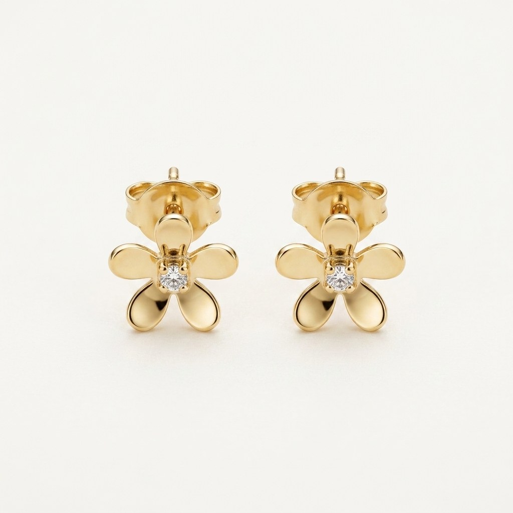 14K solid gold open petal flower stud earrings on a warm ivory background