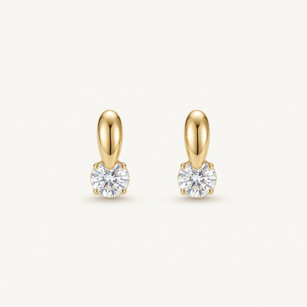 14K solid gold teardrop solitaire drop stud earrings on a warm ivory background