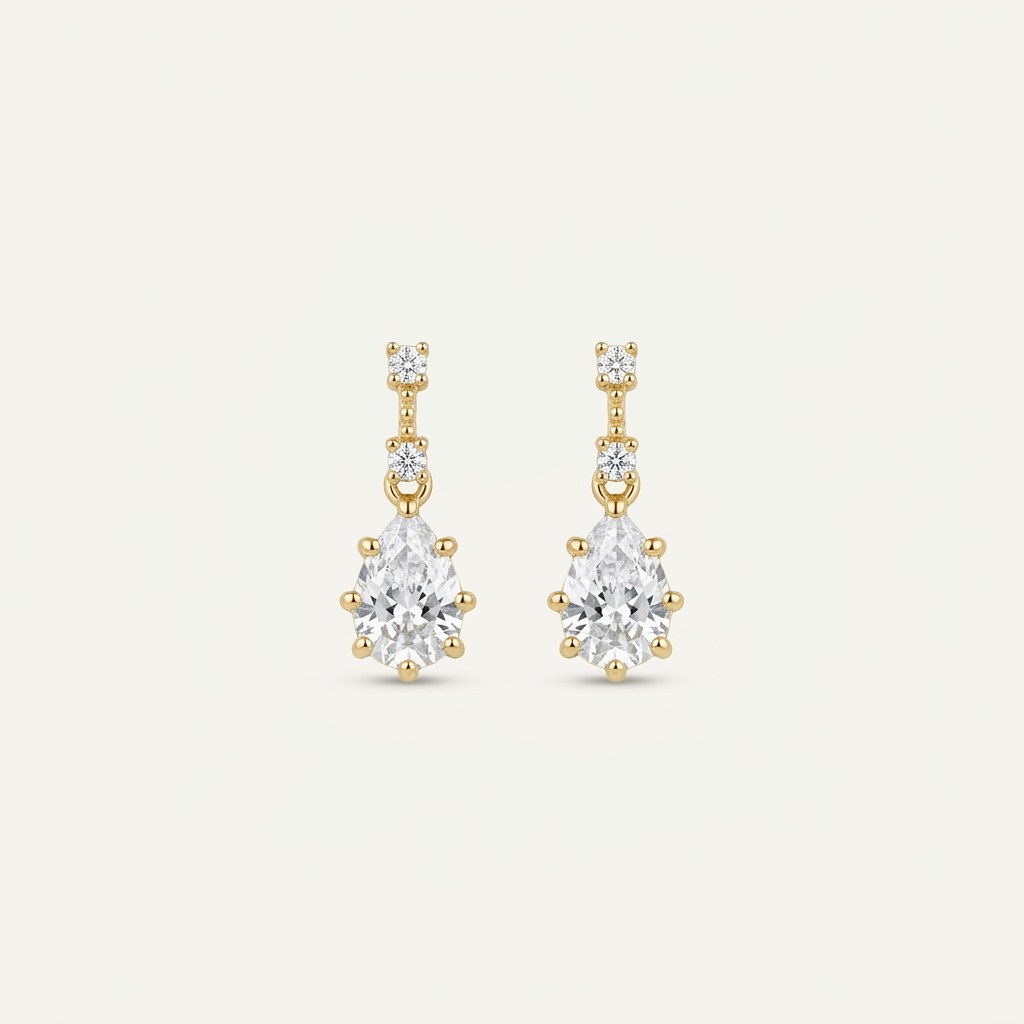 14K solid gold stone-set stud earrings on a warm ivory background
