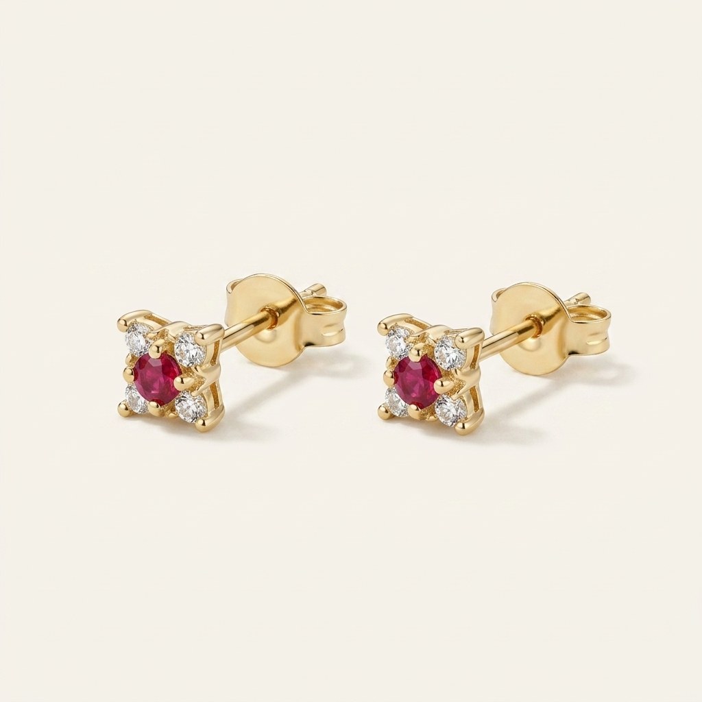 14K solid gold ruby flower cluster stud earrings on a warm ivory background