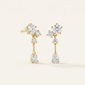 14K solid gold teardrop bar drop stud earrings on a warm ivory background