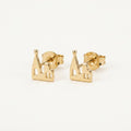 14K solid gold city skyline stud earrings on a warm ivory background