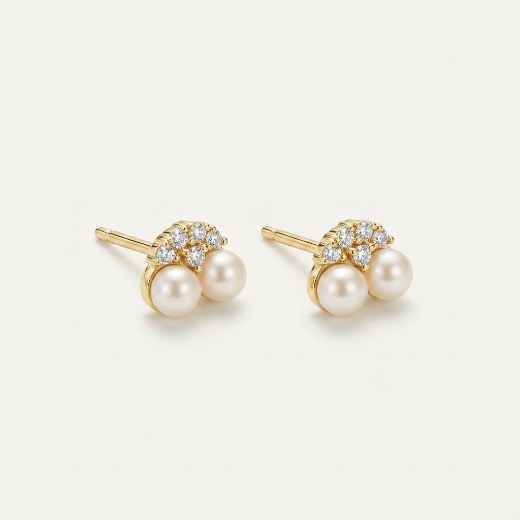 14K solid gold pearl crystal cluster stud earrings on a warm ivory background