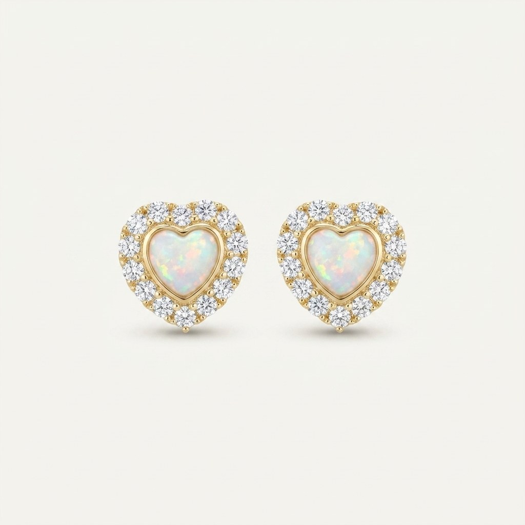 14K solid gold stone-set stud earrings on a warm ivory background