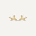 14K solid gold stone-set stud earrings on a warm ivory background