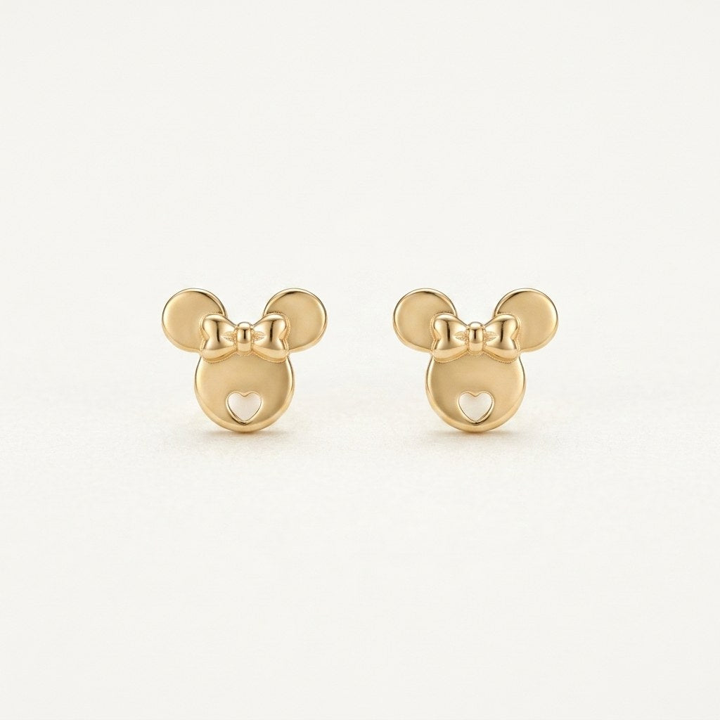 14K solid gold mouse face stud earrings on a warm ivory background