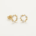 14K solid gold floral wreath stud earrings on a warm ivory background