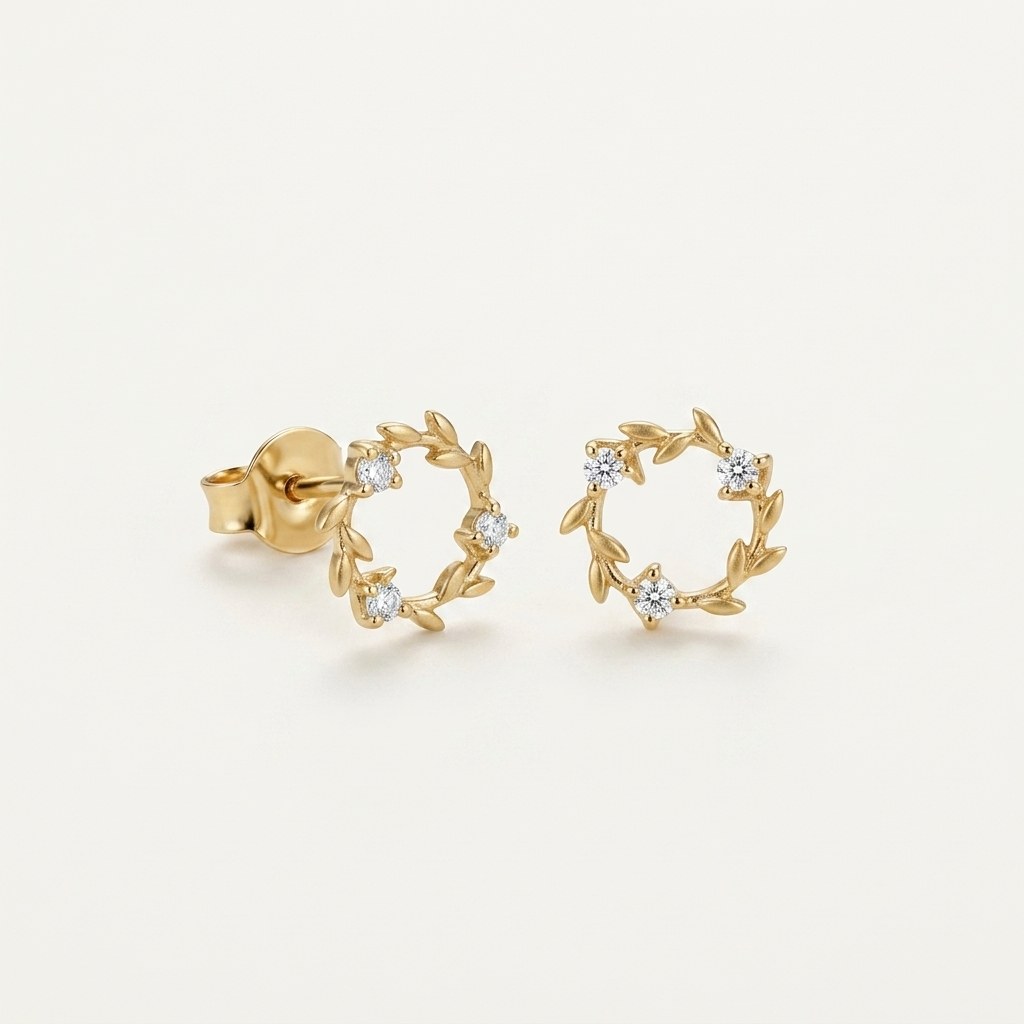 14K solid gold floral wreath stud earrings on a warm ivory background