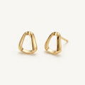 14K solid gold sculpted teardrop stud earrings on a warm ivory background