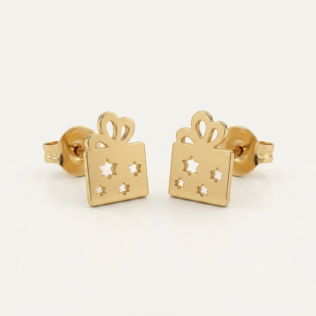 14K solid gold star gift box stud earrings on a warm ivory background