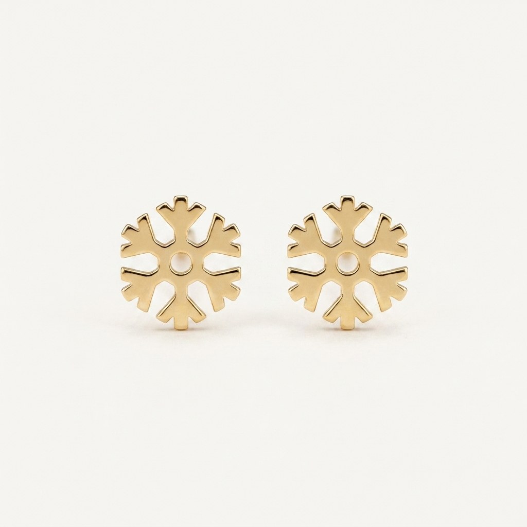 14K solid gold stud earrings on a warm ivory background