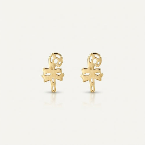 14K solid gold stud earrings on a warm ivory background