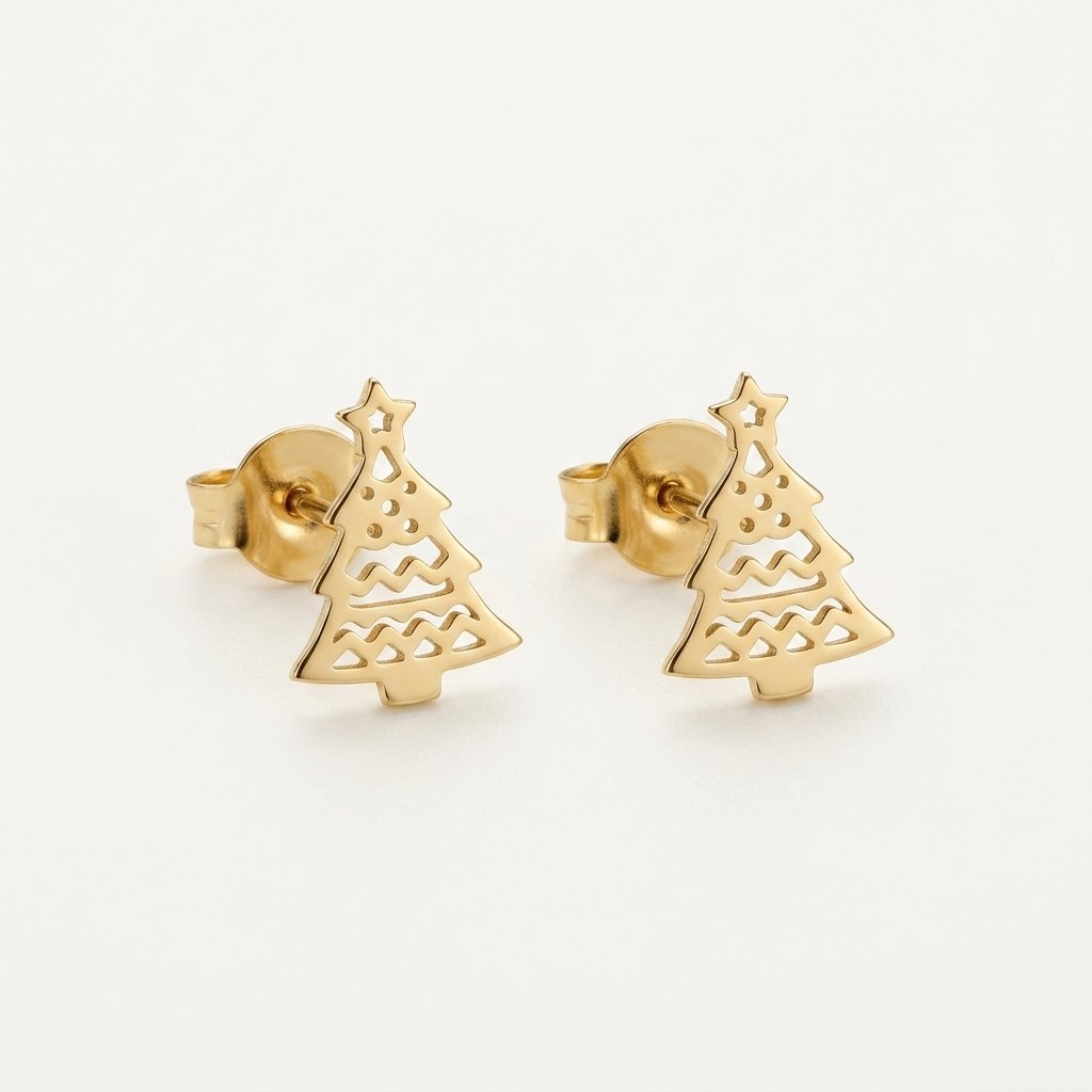14K solid gold christmas tree stud earrings on a warm ivory background