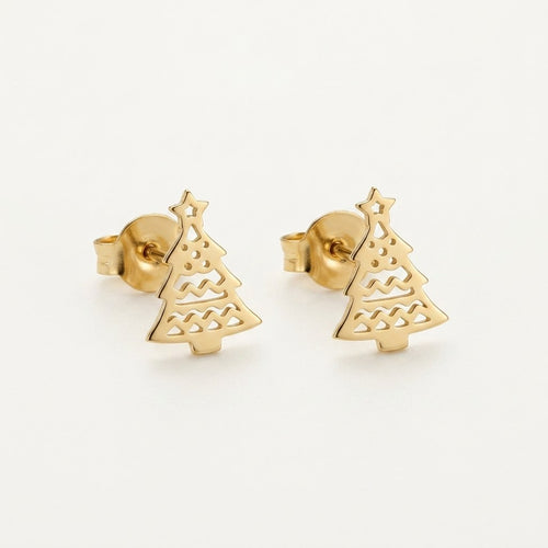 14K solid gold christmas tree stud earrings on a warm ivory background