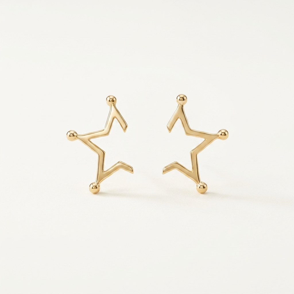 14K solid gold stud earrings on a warm ivory background