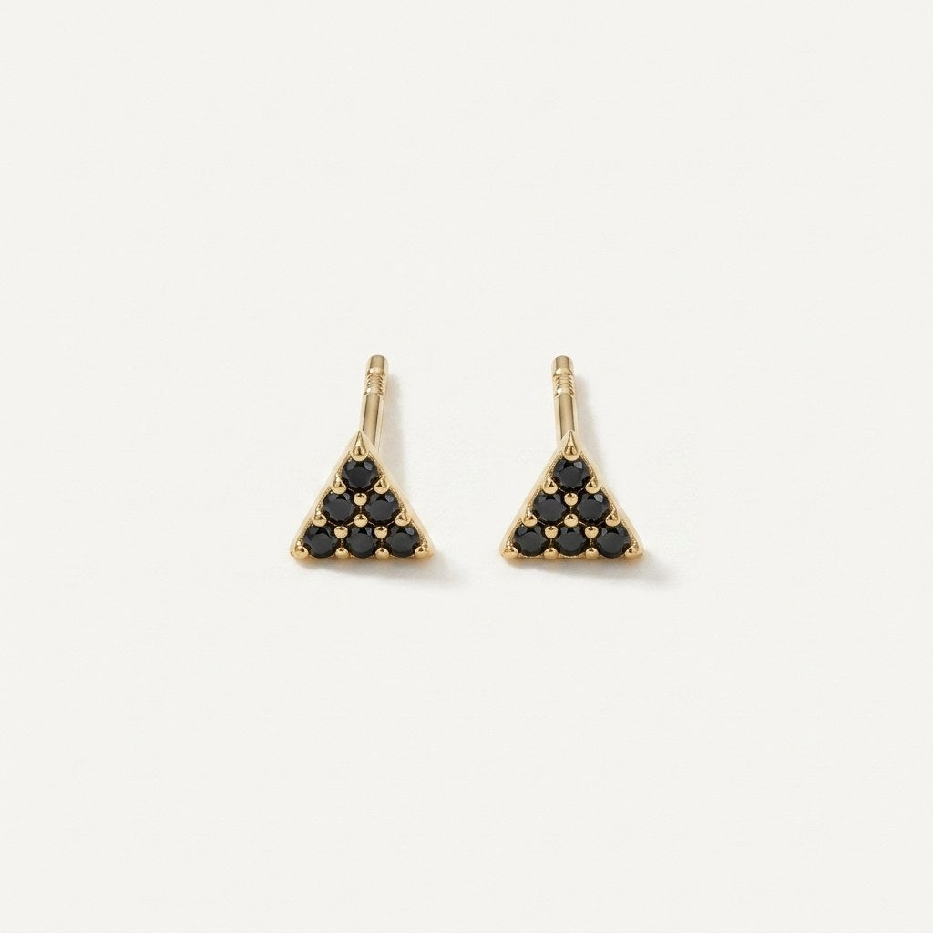 14K solid gold black pave triangle stud earrings on a warm ivory background