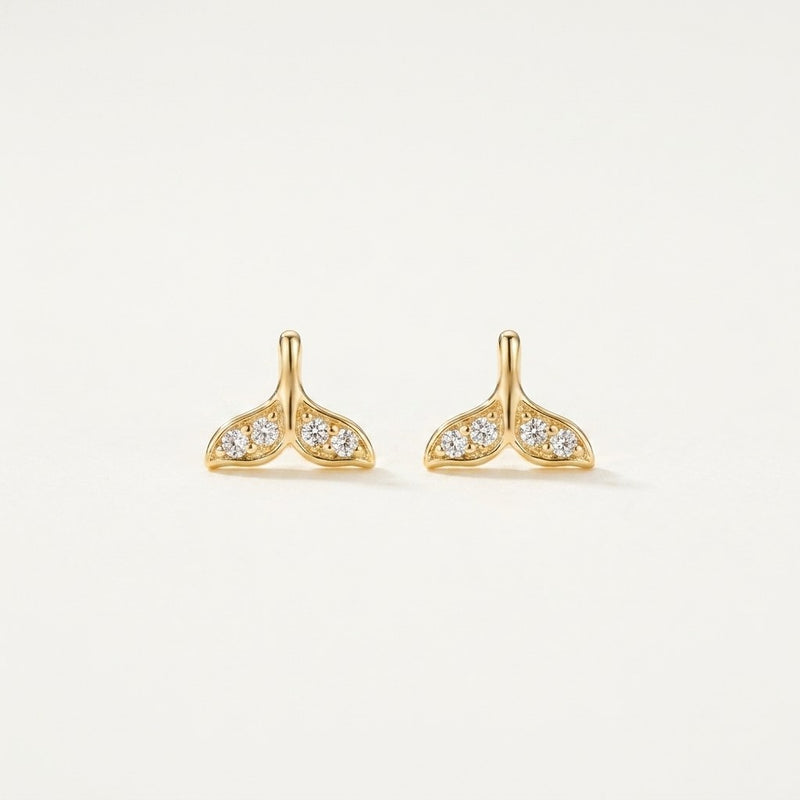14K solid gold stone-set stud earrings on a warm ivory background