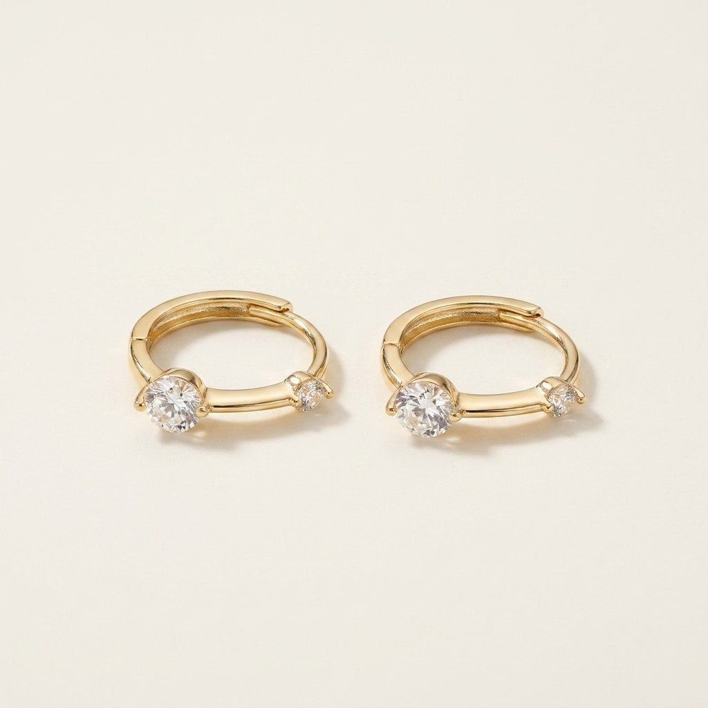 Solid Gold Hoop Earrings - 7.5mm Inner Diameter - Style 618 in yellow gold on a warm ivory background