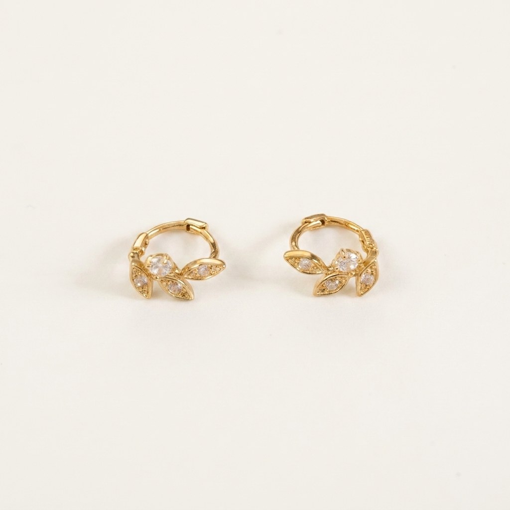 Solid Gold Hoop Earrings - 5.8mm Inner Diameter - Style 619 in yellow gold on a warm ivory background