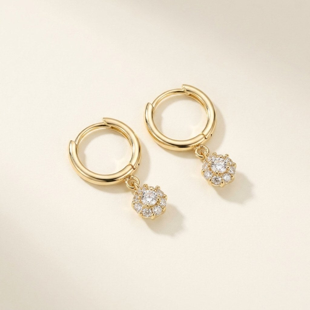 Solid Gold Hoop Earrings - 9.5mm Inner Diameter - Style 626 in yellow gold on a warm ivory background