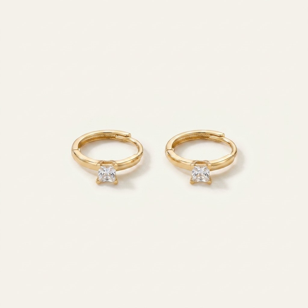 Solid Gold Hoop Earrings - 6.7mm Inner Diameter - Style 628 in yellow gold on a warm ivory background