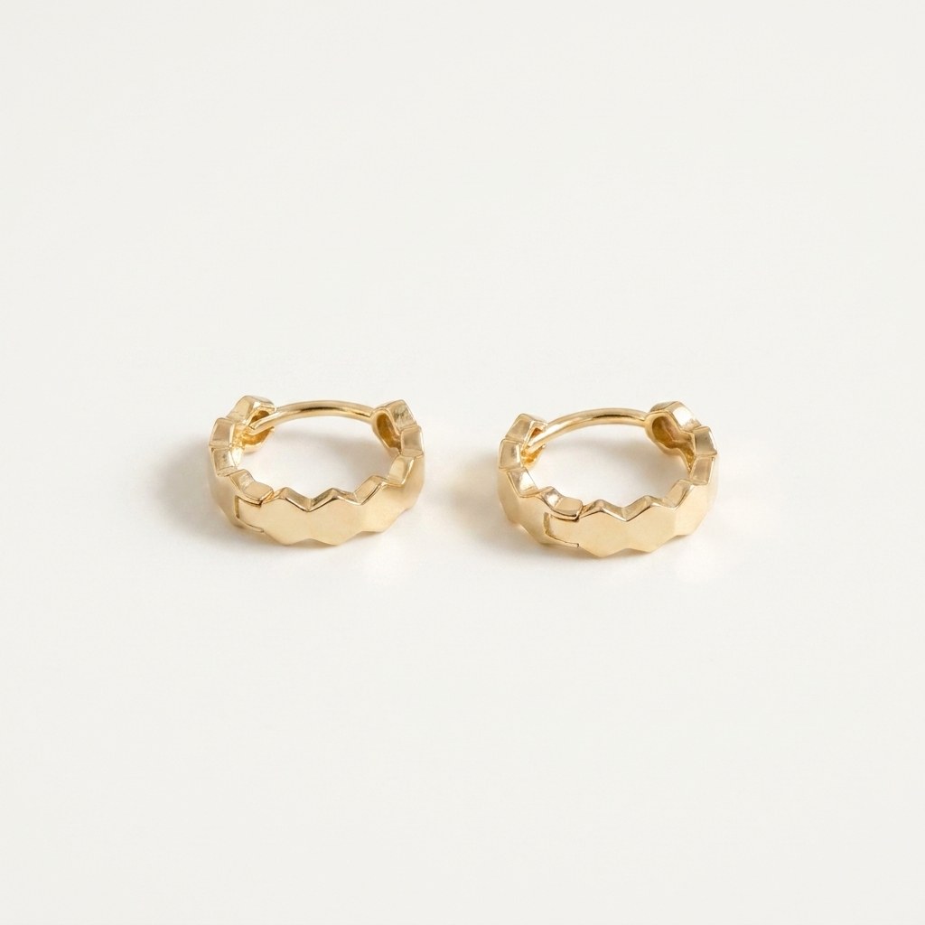 Solid Gold Hoop Earrings - 7.5mm Inner Diameter - Style 630 in yellow gold on a warm ivory background