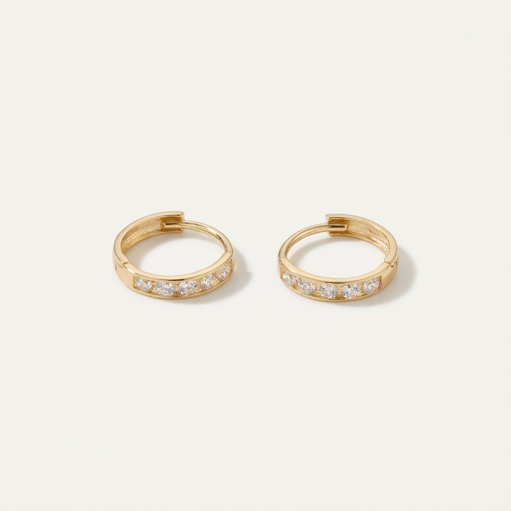 Solid Gold Hoop Earrings - 8.3mm Inner Diameter - Style 635 in yellow gold on a warm ivory background
