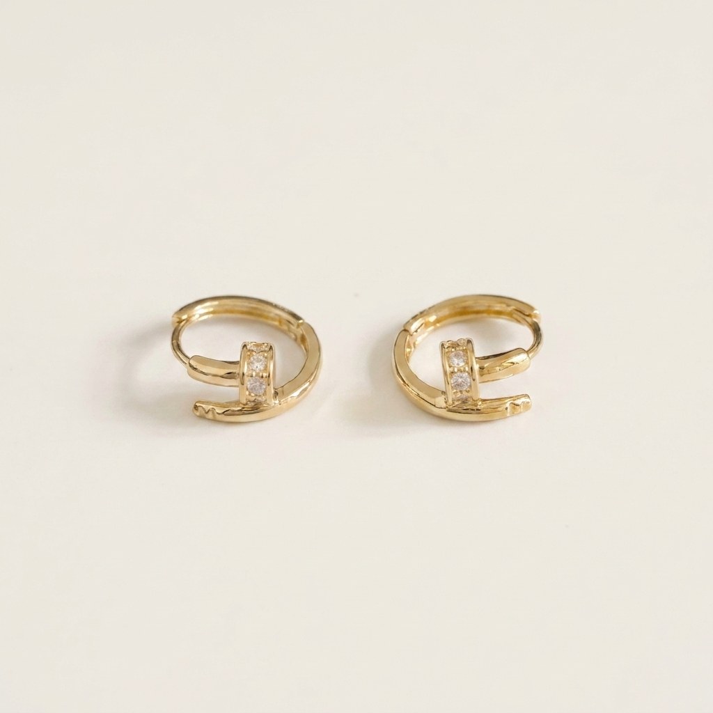 Solid Gold Hoop Earrings - 5mm / 8mm Inner Diameter - Style 641 in yellow gold on a warm ivory background