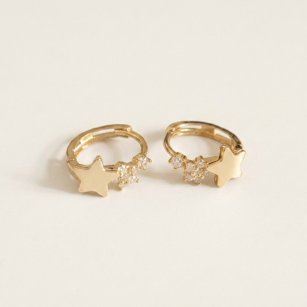 Solid Gold Hoop Earrings - 7mm Inner Diameter - Style 658 in yellow gold on a warm ivory background