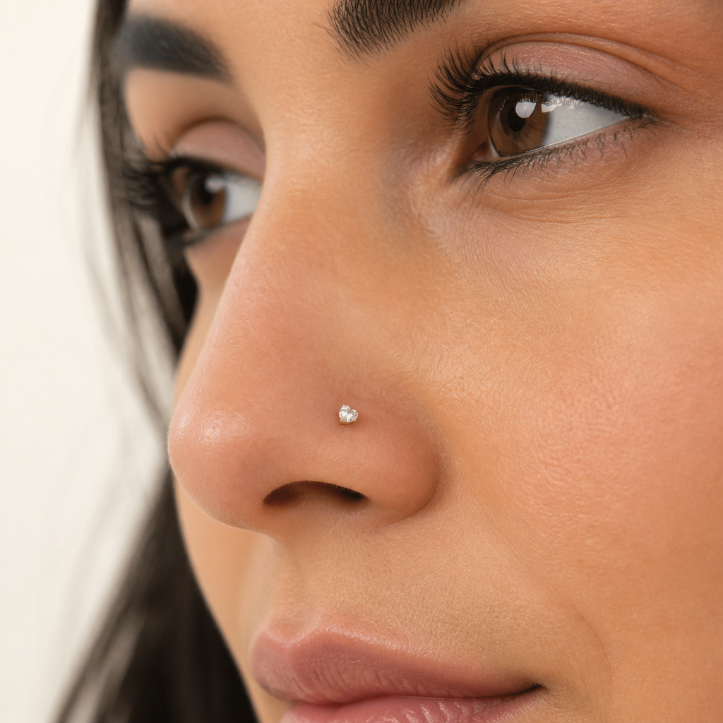 Solid Gold Heart Gemstone Nose Stud worn on the nose