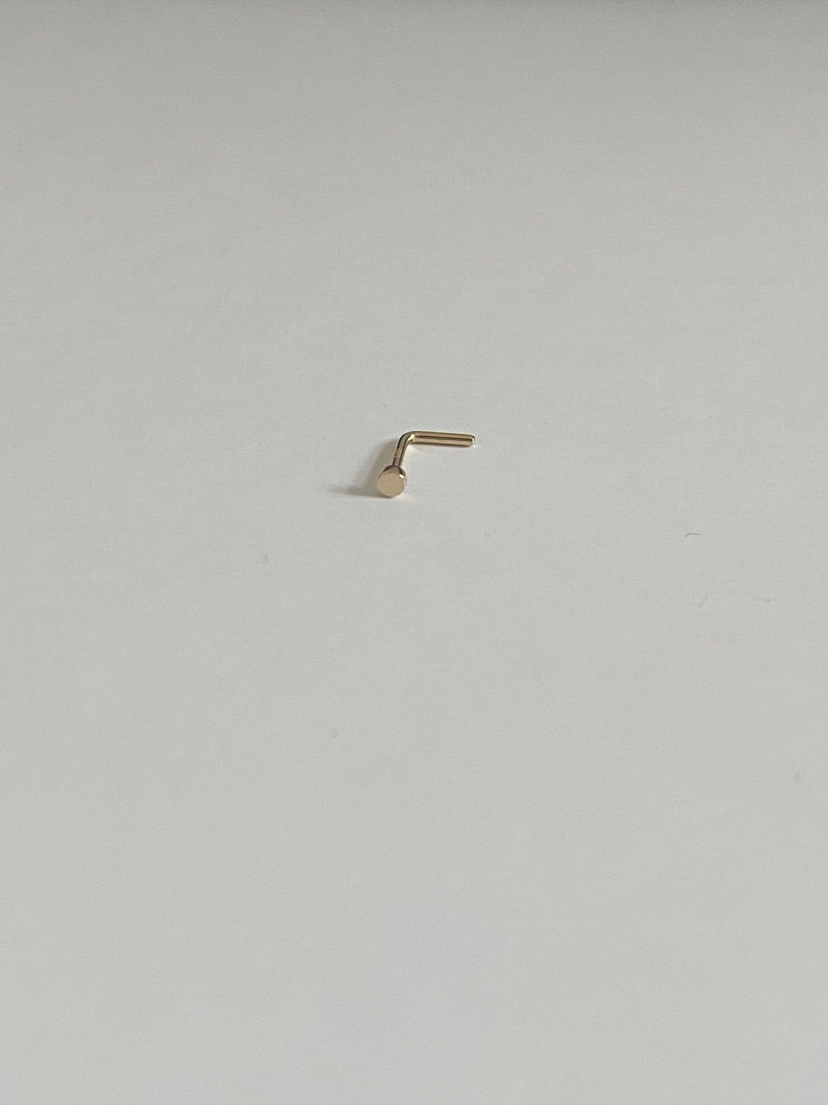 Actual product photo of Solid Gold Disc Nose Stud