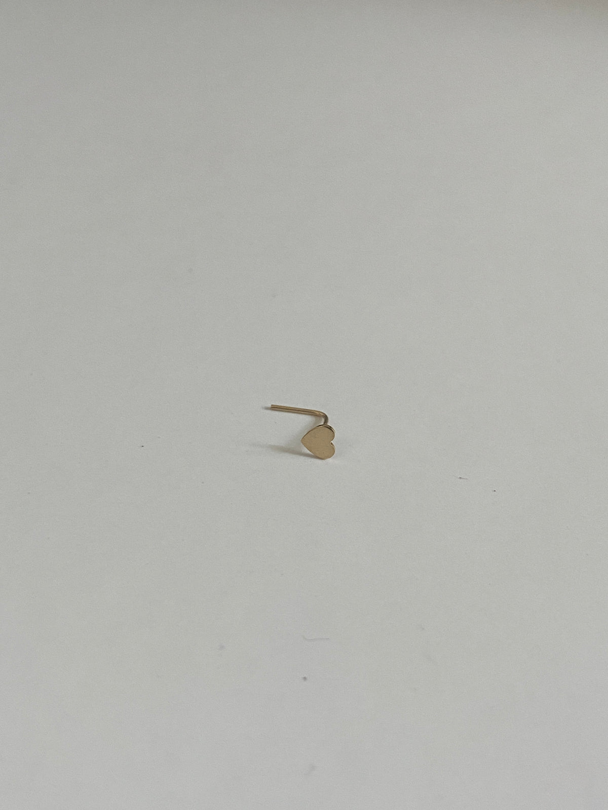 Actual product photo of Solid Gold Heart Nose Stud