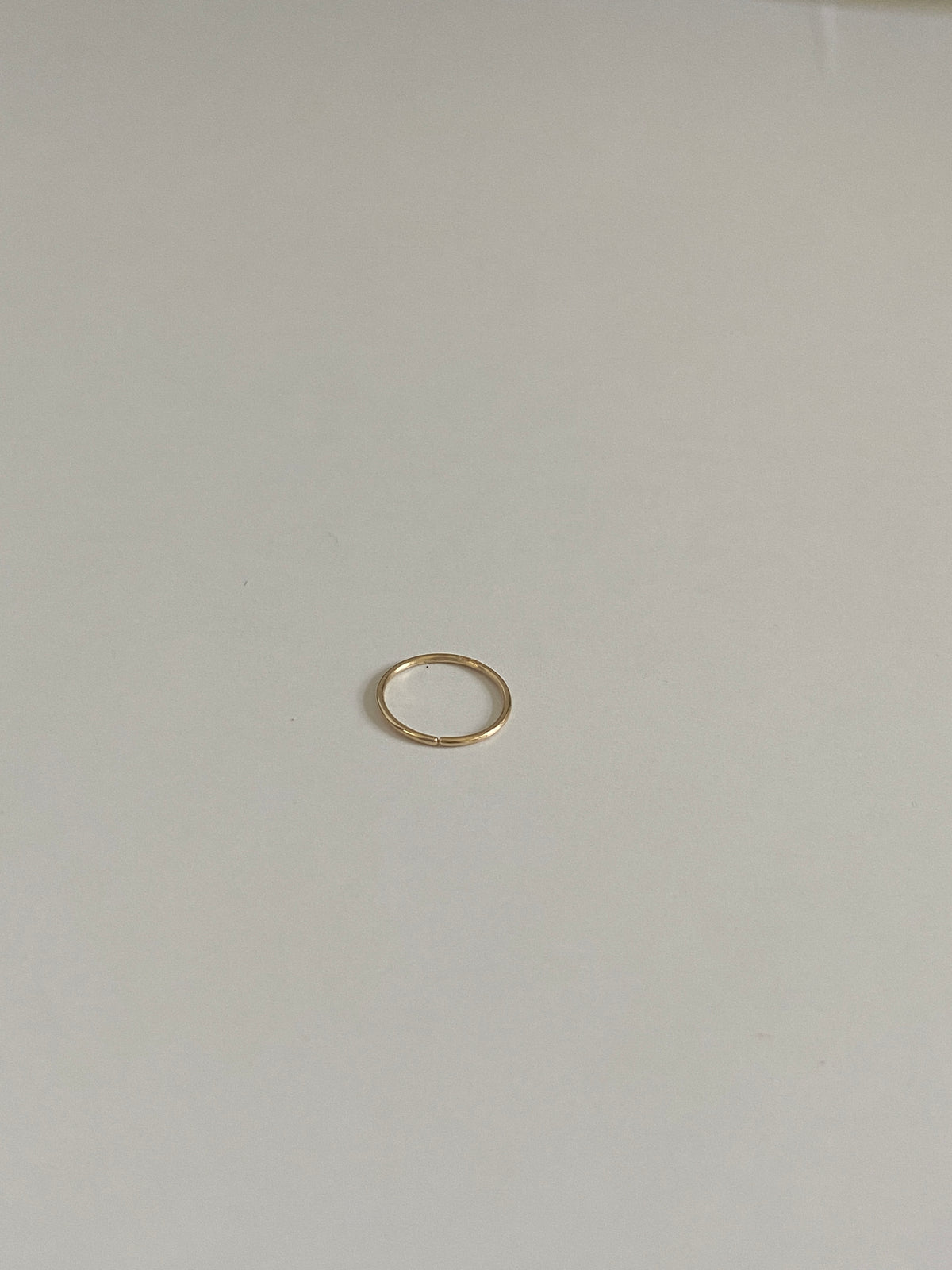 Actual product photo of Solid Gold Seamless Nose Hoop